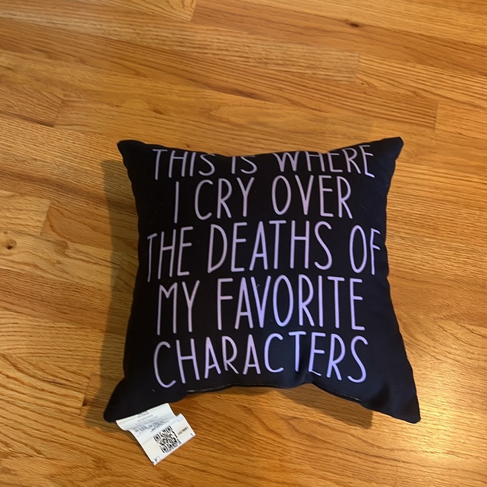 Black Pillow with White Text